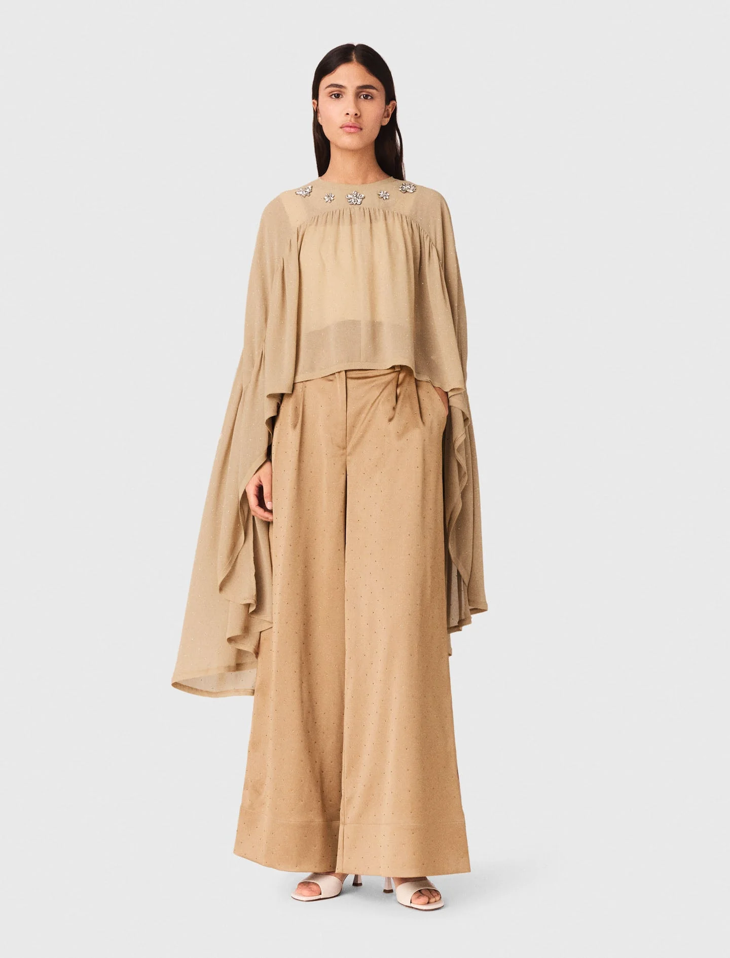 Cape top with jewel collar